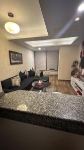 Χώρος καθιστικού στο Elysium Service Apartment, Islamabad +1 φωτογραφίες