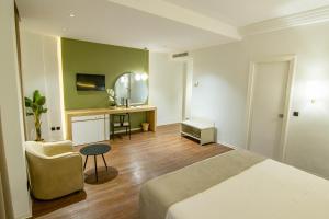 Giường trong phòng chung tại Hotel Ibn Khaldoun