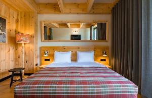 Letto o letti in una camera di 1740 Boutique Hotel Kazbegi