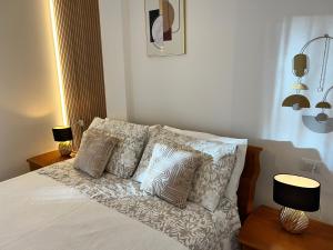 Postel nebo postele na pokoji v ubytování Blue Moon Penthouse