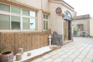 a building with a sign on the side of it at Meet Xiashu in Jincheng +51 photos