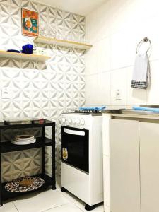 Kuchyň nebo kuchyňský kout v ubytování Apartamento na Orla de Copacabana + 7 fotografií