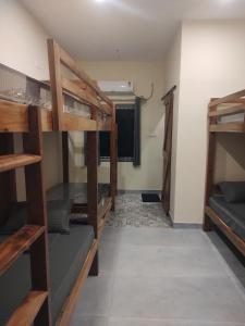 Letto o letti a castello in una camera di Tavāsmi