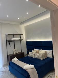 Letto o letti in una camera di Aries Suite Pompei