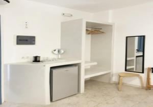 Η κουζίνα ή μικρή κουζίνα στο Glaros Hotel (By The Sea)