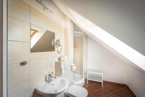 Kúpeľňa v ubytovaní Hotel Tanzberg Mikulov