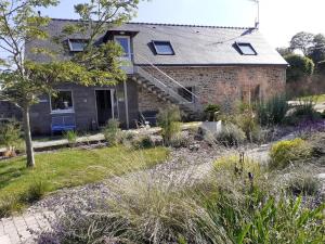 a house with a garden in front of it at Les Gites de Kerdurod in Guidel +41 photos