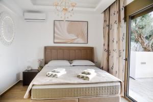 Posteľ alebo postele v izbe v ubytovaní Sea View Private Pool Villa Katrin + 37 fotografií