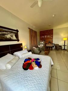 Cama ou camas em um quarto em Cambará Eco Hotel