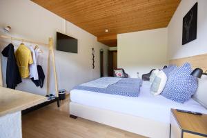 Postel nebo postele na pokoji v ubytování Landhotel Fuchs