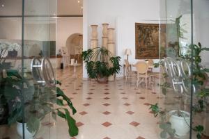 Restoran või mõni muu söögikoht majutusasutuses OSTUNI PALACE - Hotel Bistrot & SPA
