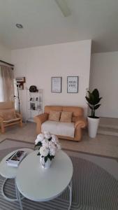 Η κουζίνα ή μικρή κουζίνα στο Cozy House in Taiping