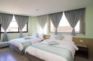 Llit o llits en una habitació de Chamie B&B