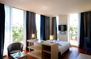 Postel nebo postele na pokoji v ubytování Best Western Hotel Globus + 37 fotografií