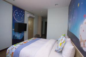 Llit o llits en una habitació de Chamie B&B