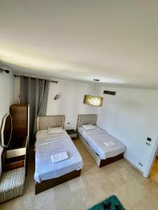 A bed or beds in a room at New Marina MP 37