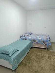 Postel nebo postele na pokoji v ubytování loft 01 Manaus