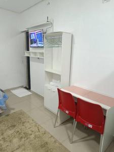 TV a/nebo společenská místnost v ubytování loft 01 Manaus