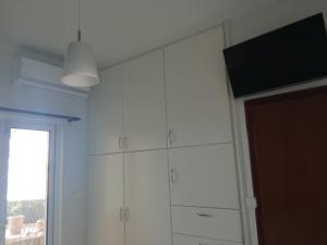 TV a/nebo společenská místnost v ubytování Sea Side House Kourouta
