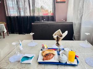a tray of breakfast food on a table at Hotel magicland dakar in Dakar