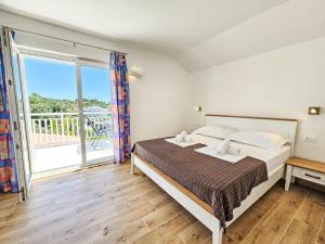 Posteľ alebo postele v izbe v ubytovaní Apartment Balota - Moreška-4 by Interhome