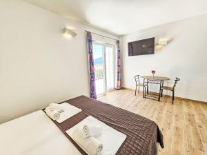 Posteľ alebo postele v izbe v ubytovaní Apartment Balota - Moreška-4 by Interhome