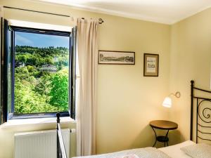 Postel nebo postele na pokoji v ubytování Apartment Chopin by Interhome