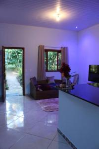 Posezení v ubytování Casa da Rua do Coreto do Capão