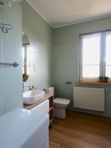 Łazienka w obiekcie Apartamenty Vega
