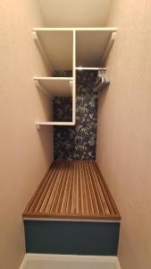 a closet with a bed in a room at No 12 B&B in Dungarvan