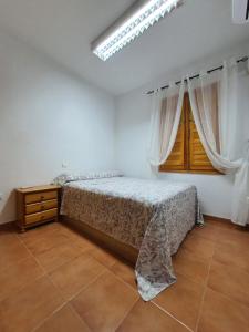 Postel nebo postele na pokoji v ubytování Apartamento San Agustín Playa