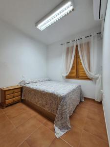 Postel nebo postele na pokoji v ubytování Apartamento San Agustín Playa
