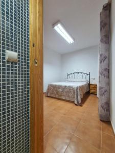 Postel nebo postele na pokoji v ubytování Apartamento San Agustín Playa