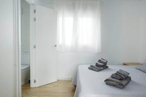 Cama o camas de una habitación en Espectacular ático en primera línea con vistas