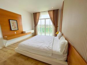 Postel nebo postele na pokoji v ubytování Chang HomeStay Phan Thiết Villa SeaLink&Ocean Vista------------------------------------------------------Căn Hộ Sát Biển-------------Long-Term Rental----------Monthly Rental-------------------------------------------------------GGle CHANG HOMESTAY Mui Ne