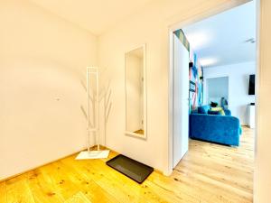 TV a/nebo společenská místnost v ubytování Wohnung mit Balkon + 2 fotografie