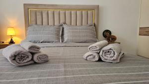 Postel nebo postele na pokoji v ubytování Value Living Apartment