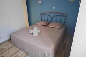 Postel nebo postele na pokoji v ubytování Maison Puylaurentaise