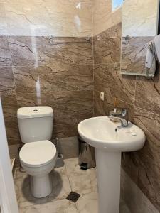 Vannas istaba naktsmītnē Soso Burduli's Guesthouse
