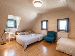 Postel nebo postele na pokoji v ubytování Holiday Home Bílý Potok by Interhome