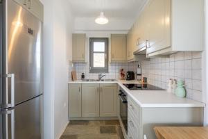 Kuchyňa alebo kuchynka v ubytovaní Avra House Kythnos
