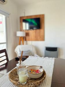 Televiisor ja/või meelelahutuskeskus majutusasutuses Departamento en Villaguay