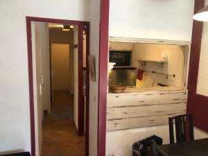 Kuchyň nebo kuchyňský kout v ubytování appartement avec une chambre