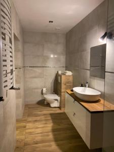 Ένα μπάνιο στο Apartament Gold 3 +12 φωτογραφίες