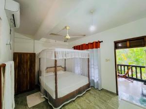 Letto o letti in una camera di Lake View Villa - Tangalle