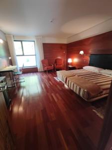 Postel nebo postele na pokoji v ubytování KYOMU Resort