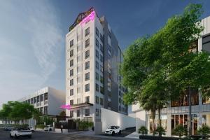 una rappresentazione architettonica di un edificio bianco di Moxy Solo a Solo