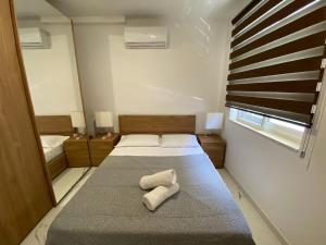 Postel nebo postele na pokoji v ubytování R1 Cosy Double Room in Msida Flat