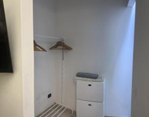 a room with a closet with a dresser at Casa Giulia in Porto SantʼElpidio