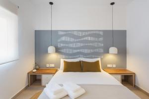 Ένα ή περισσότερα κρεβάτια σε δωμάτιο στο Apartamento Jávea Arenal Vistas al Mar
